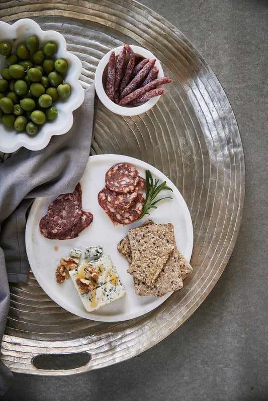 Large round decorative hammered gold tray