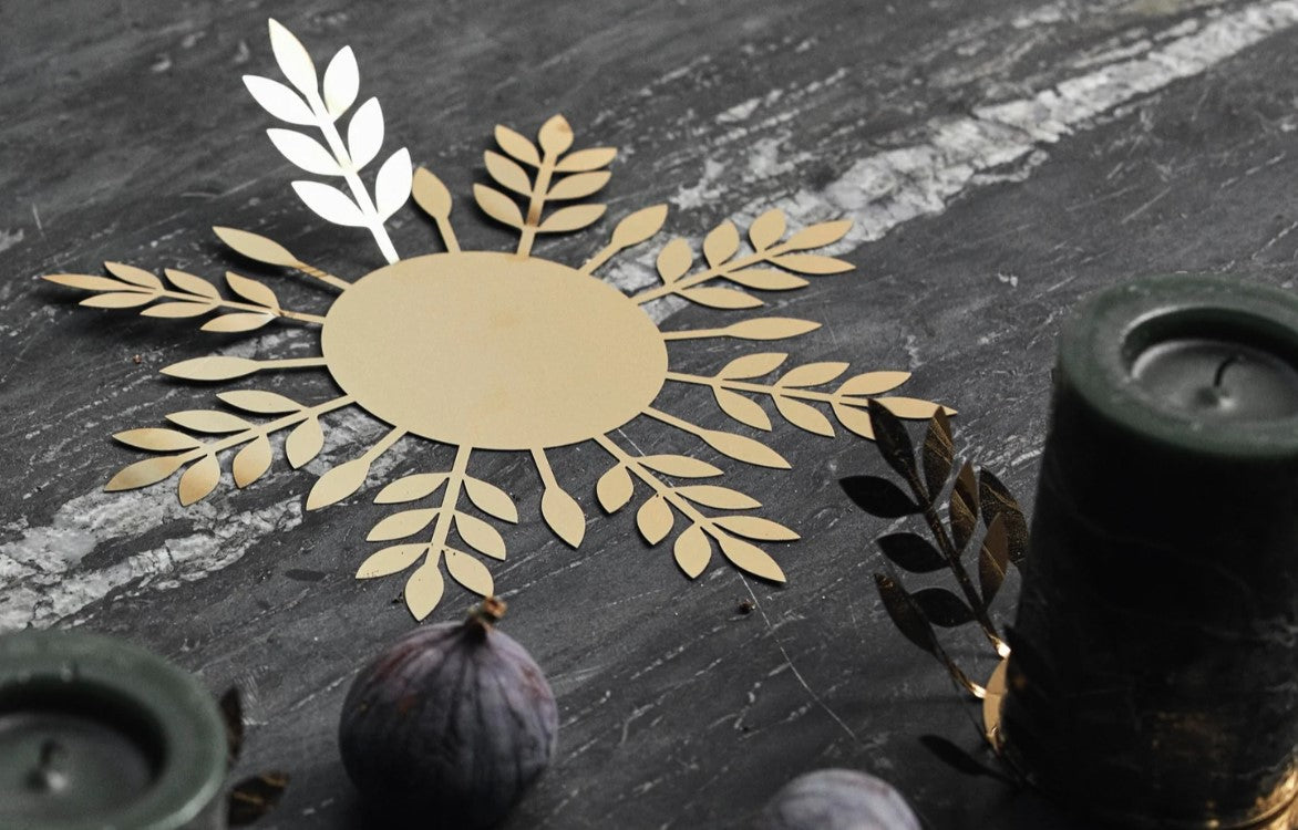 Metallic branch stencil candle holder