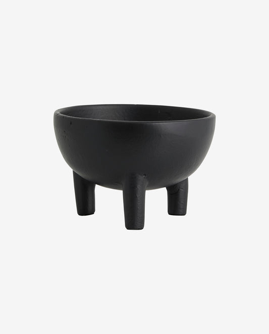 Small black bowl with three legs