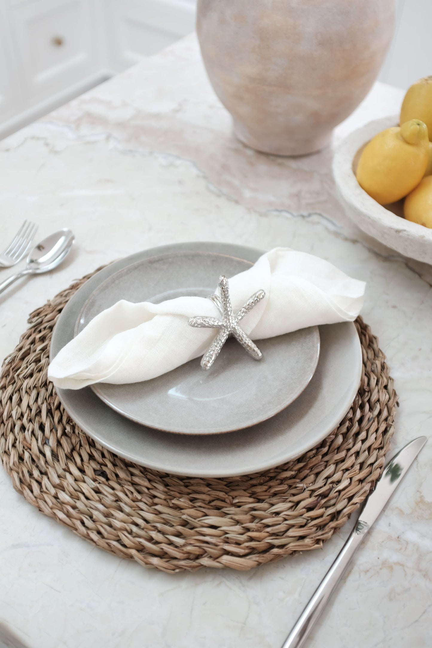 Round woven seagrass placemat