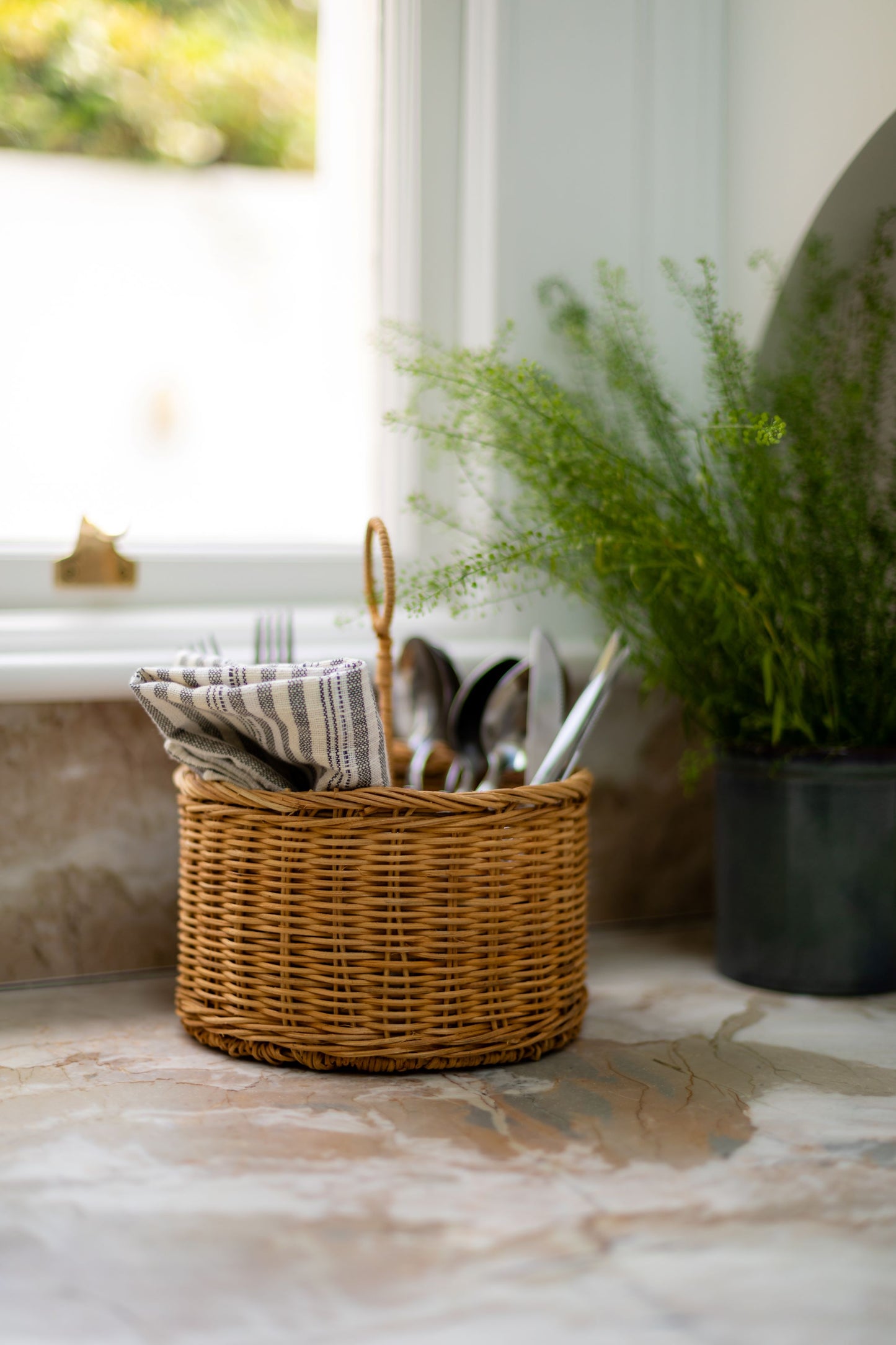 Woven rattan cutlery holder