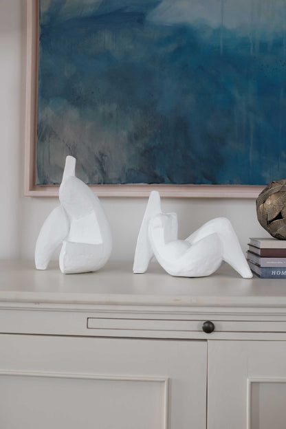 Nymph sitting figurine