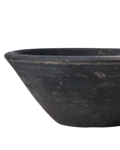 Small decorative terracotta bowl with handle