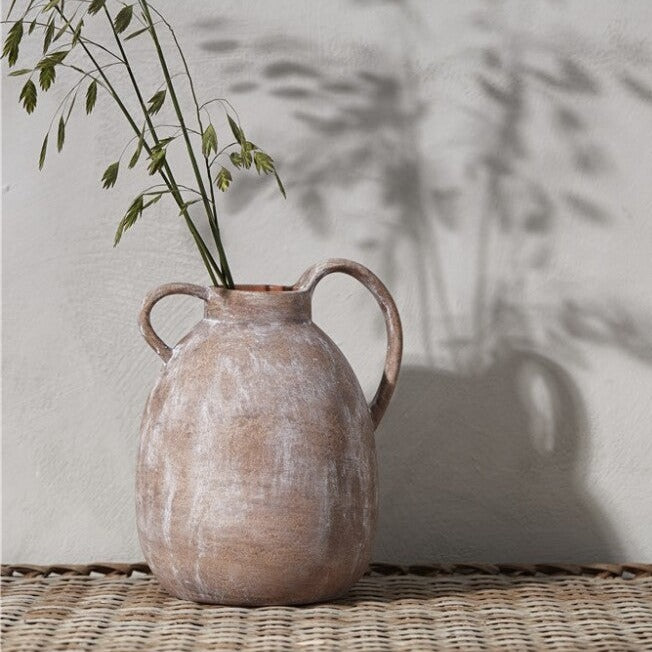 Terracotta vase with asymmetrical handles