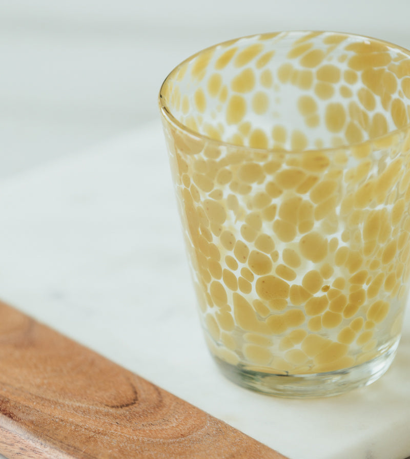 Yellow patterned drinking glass